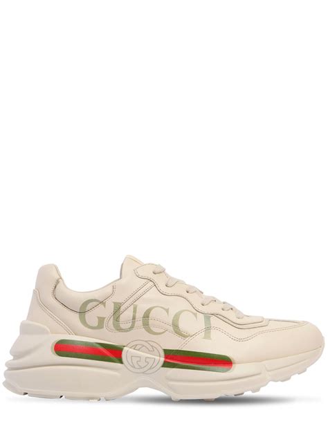 gucci rhyton gucci print leather trainer|Gucci rhyton flannel.